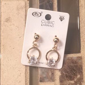 Gold stud earrings with diamond hoops